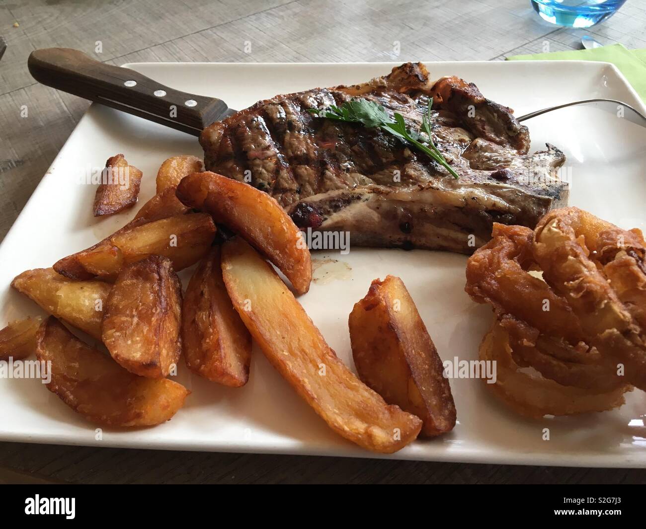 Steak chips and onion rings Stock Photo Alamy