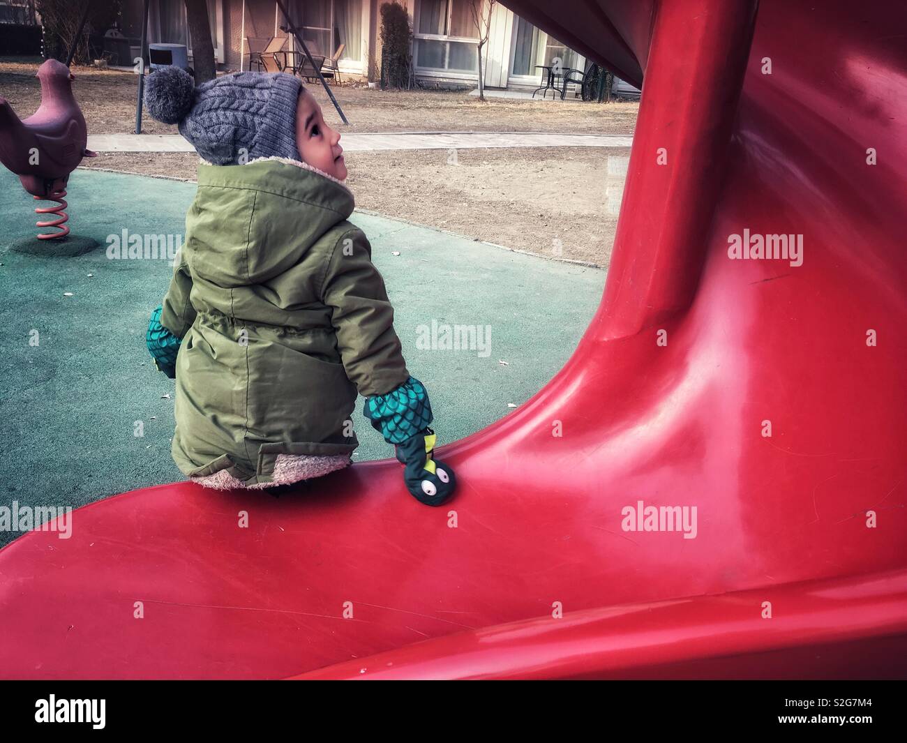 A boy on a slide. - Smartphone Captured Stock Image