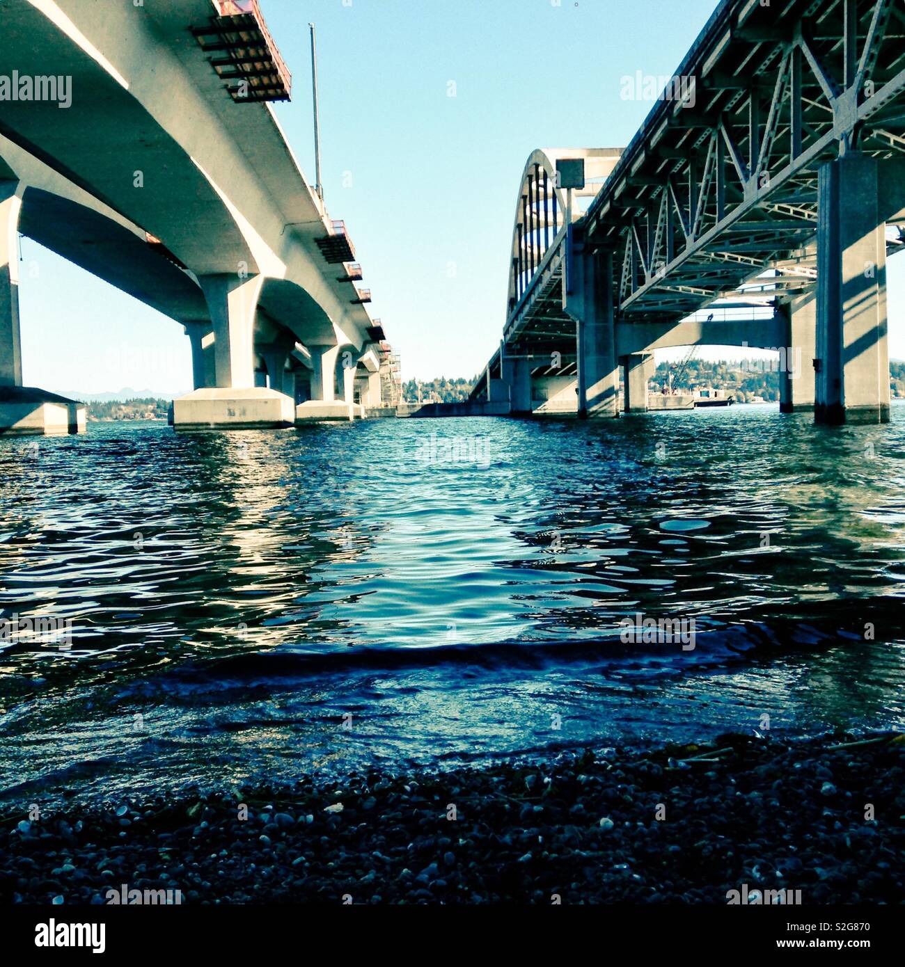 Blue-green tinge in photo of the I-90 bridge over Lake Washington to Mercer Island in Seattle - Smartphone Captured Stock Image
