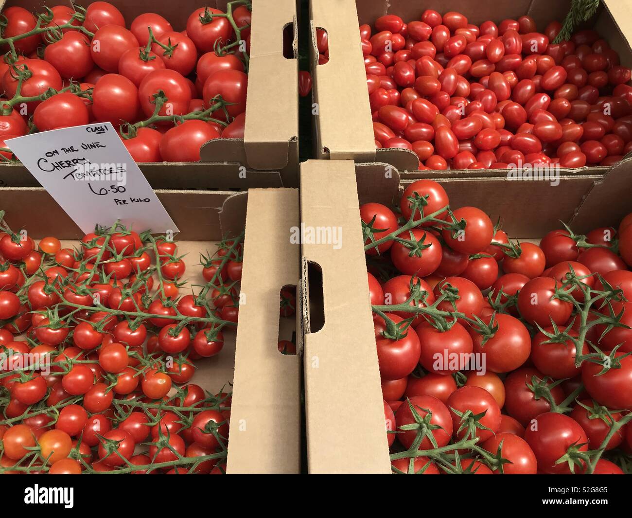Tomatoes on a market stall - Smartphone Captured Stock Image