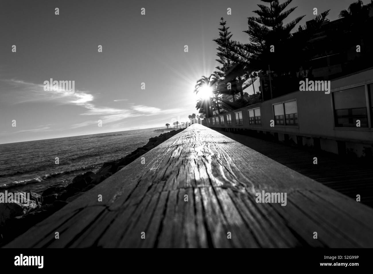 Sunset in black and white in the sea side of Spain Stock Photo