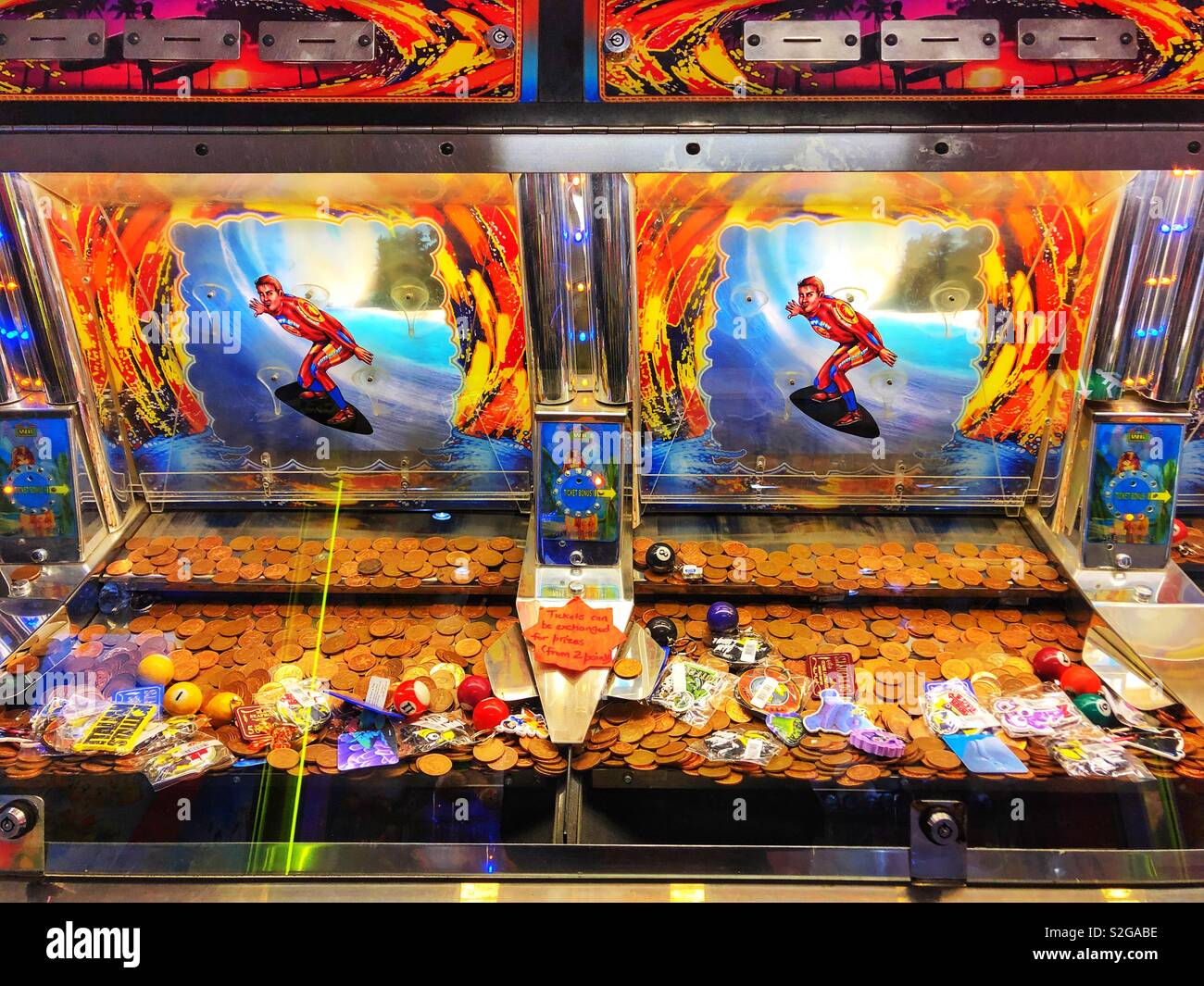 Penny falls machine at Barry Island leisure amusement arcade, as featured in the Gavin and Stacey television series. - Smartphone Captured Stock Image