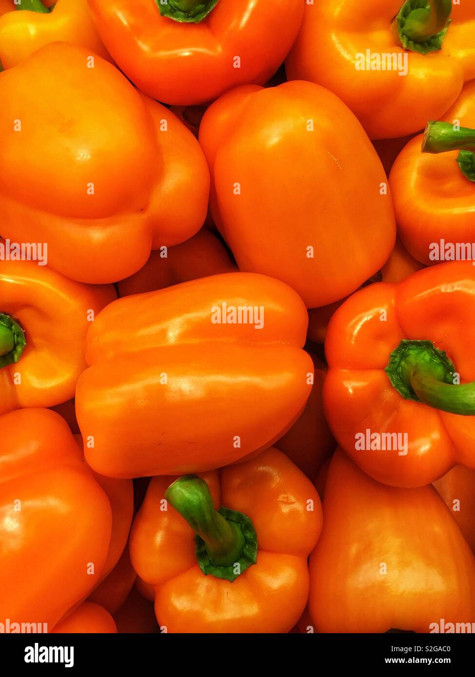 Orange peppers for sale at a market stall Stock Photo Alamy