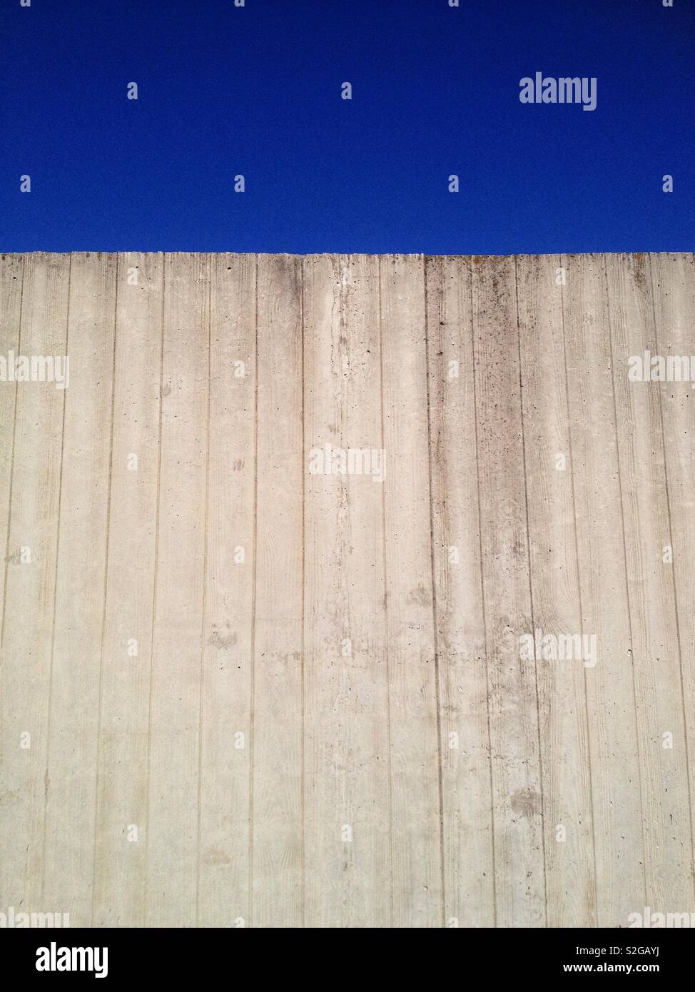 Concrete wall with imprint of shuttering  boards - Smartphone Captured Stock Image