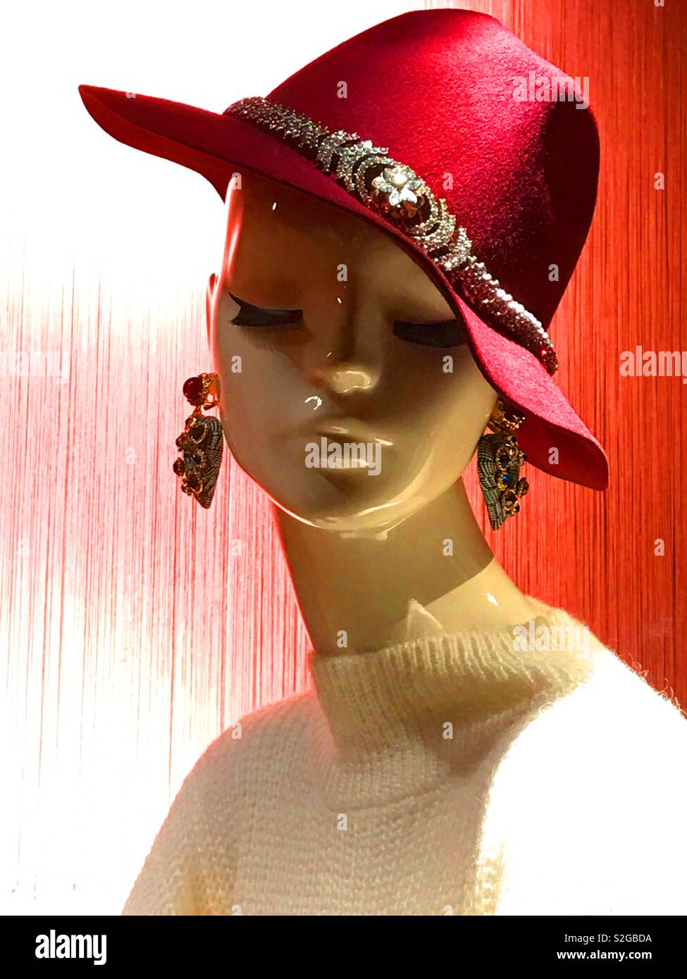 Mannequin wearing red hat - Smartphone Captured Stock Image