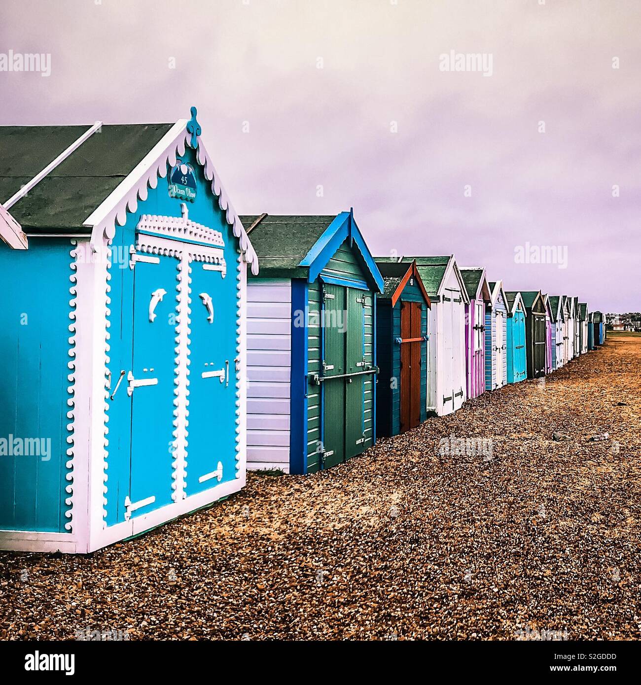 Beach huts on a winter day in Felixstowe, England Stock Photo