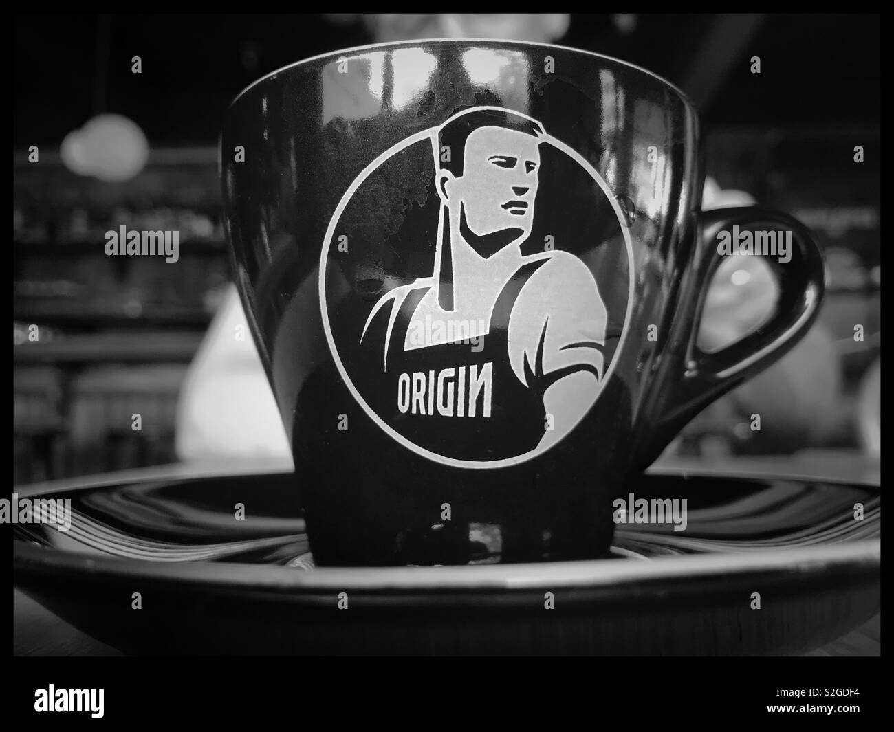 Cup of Origin coffee. - Smartphone Captured Stock Image