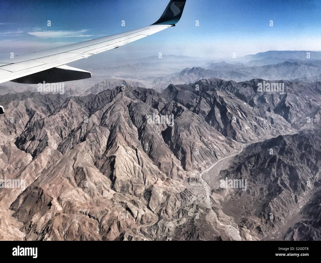 Skyscape and landscape: a view from a flight of Omani landscape Stock Photo