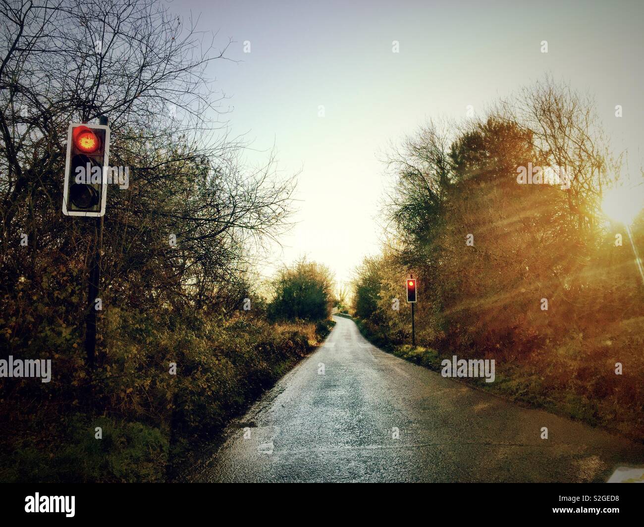 Driving down back roads through the countryside on a bright winter’s morning. - Smartphone Captured Stock Image