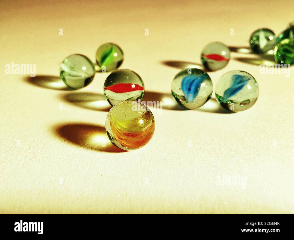 Glass marbles game hires stock photography and images Alamy