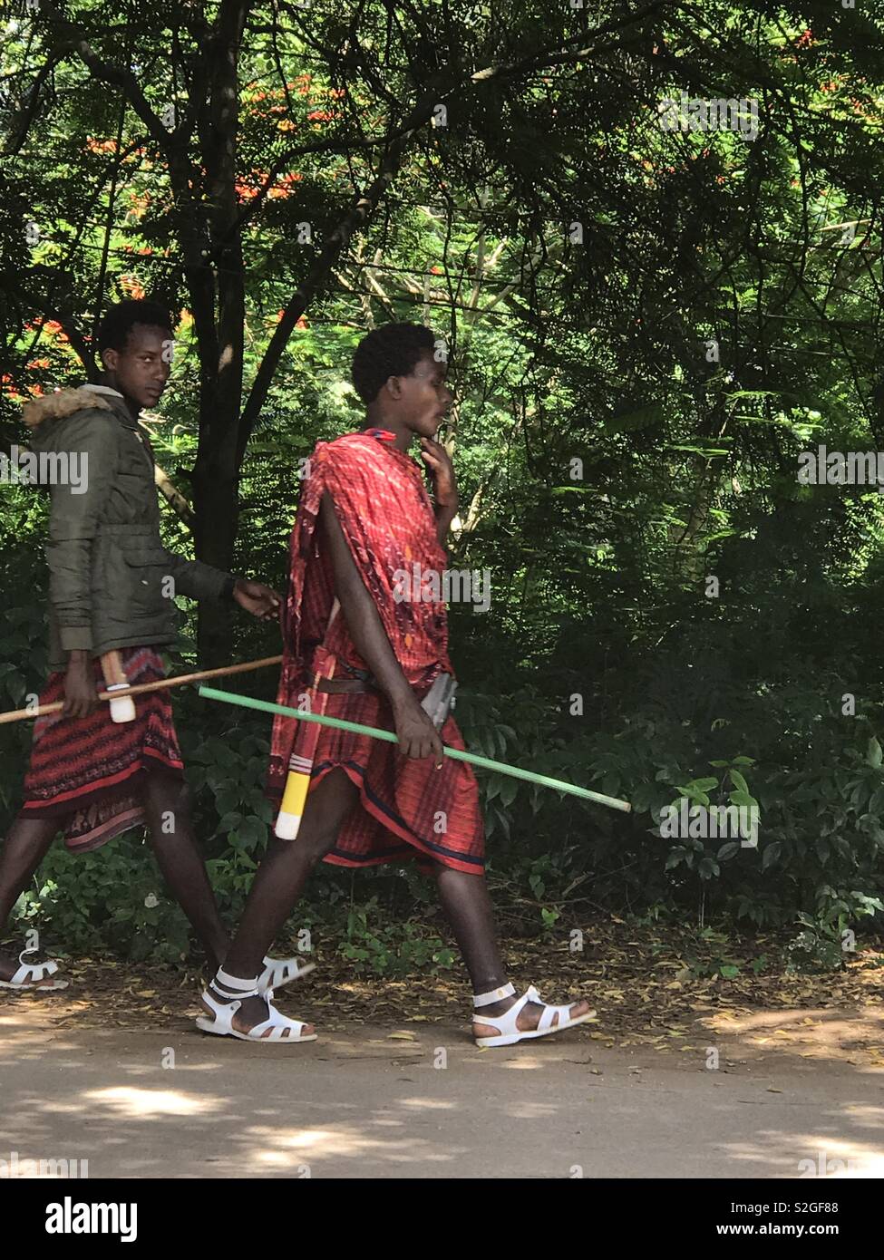 Two Men wearing Masai costume, Zanzibar Stock Photo