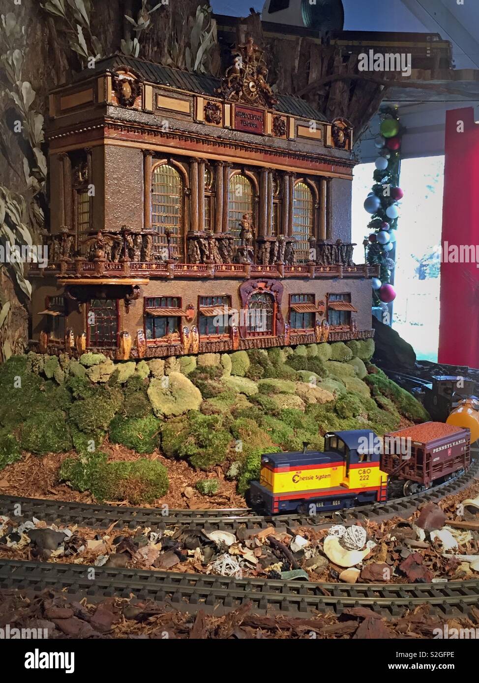 New York botanical garden holiday train show features a miniature Grand Central terminal building and trains, the Bronx, NYC, USA - Smartphone Captured Stock Image