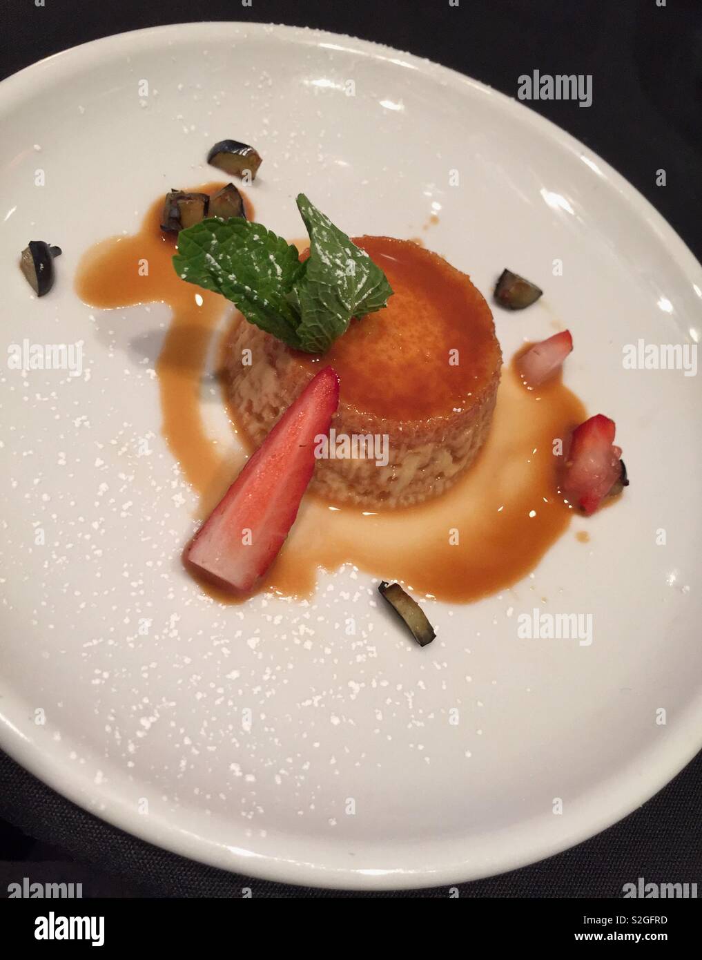 Gourmet dessert presentation at a Mexican restaurant, USA - Smartphone Captured Stock Image