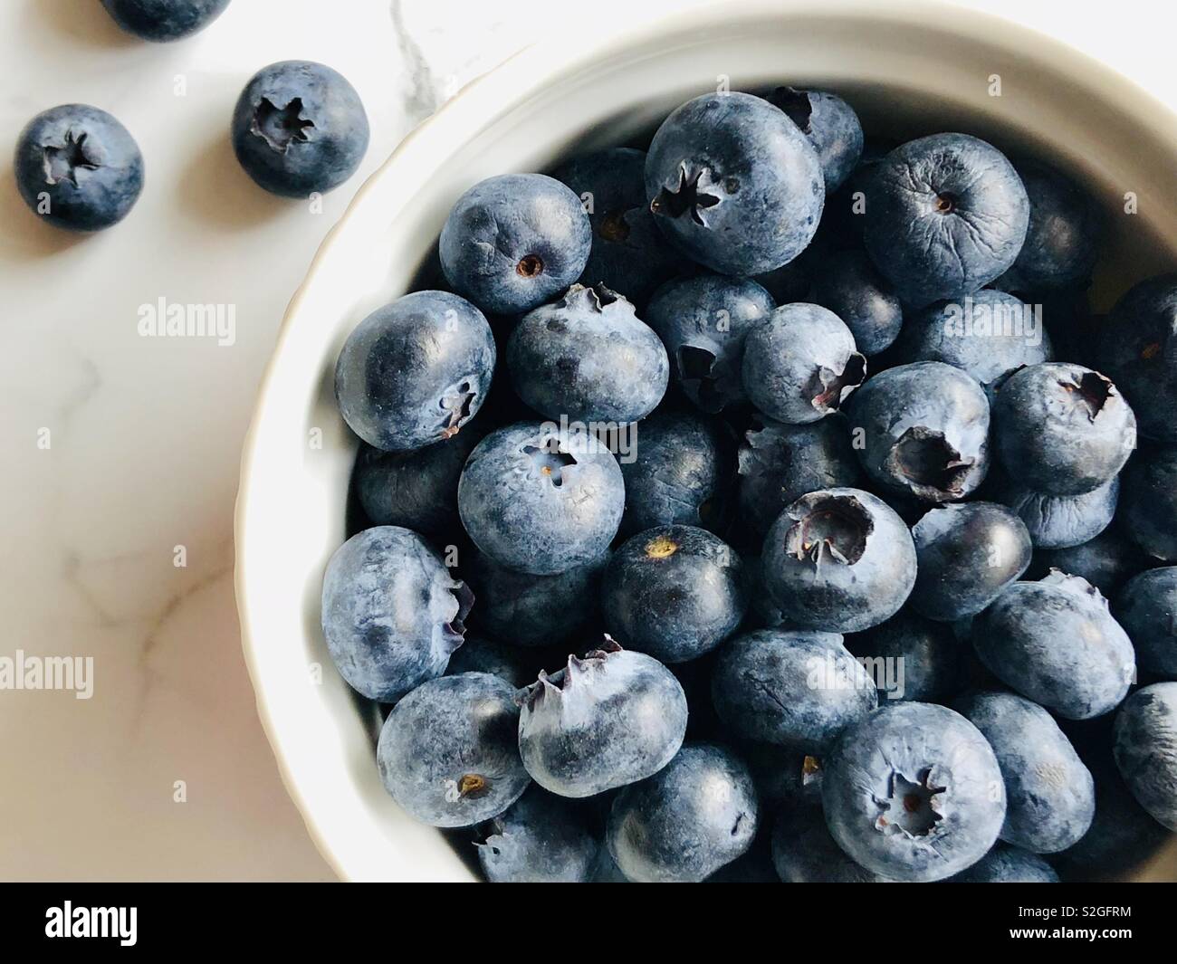 Blueberries in a white bowl - Smartphone Captured Stock Image