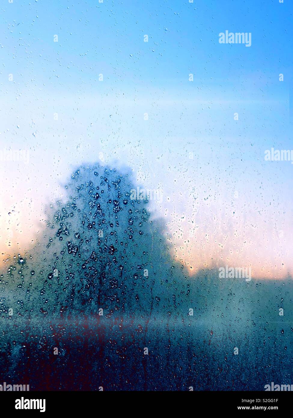 Sunrise with frost on the window - Smartphone Captured Stock Image