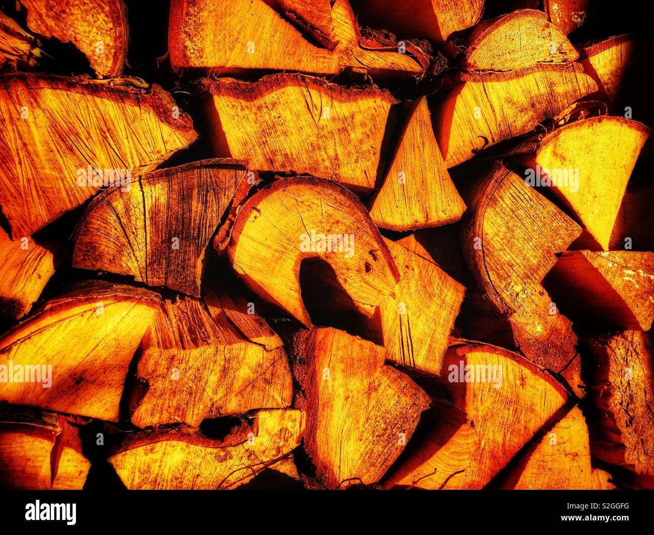 Stacked firewood logs - Smartphone Captured Stock Image