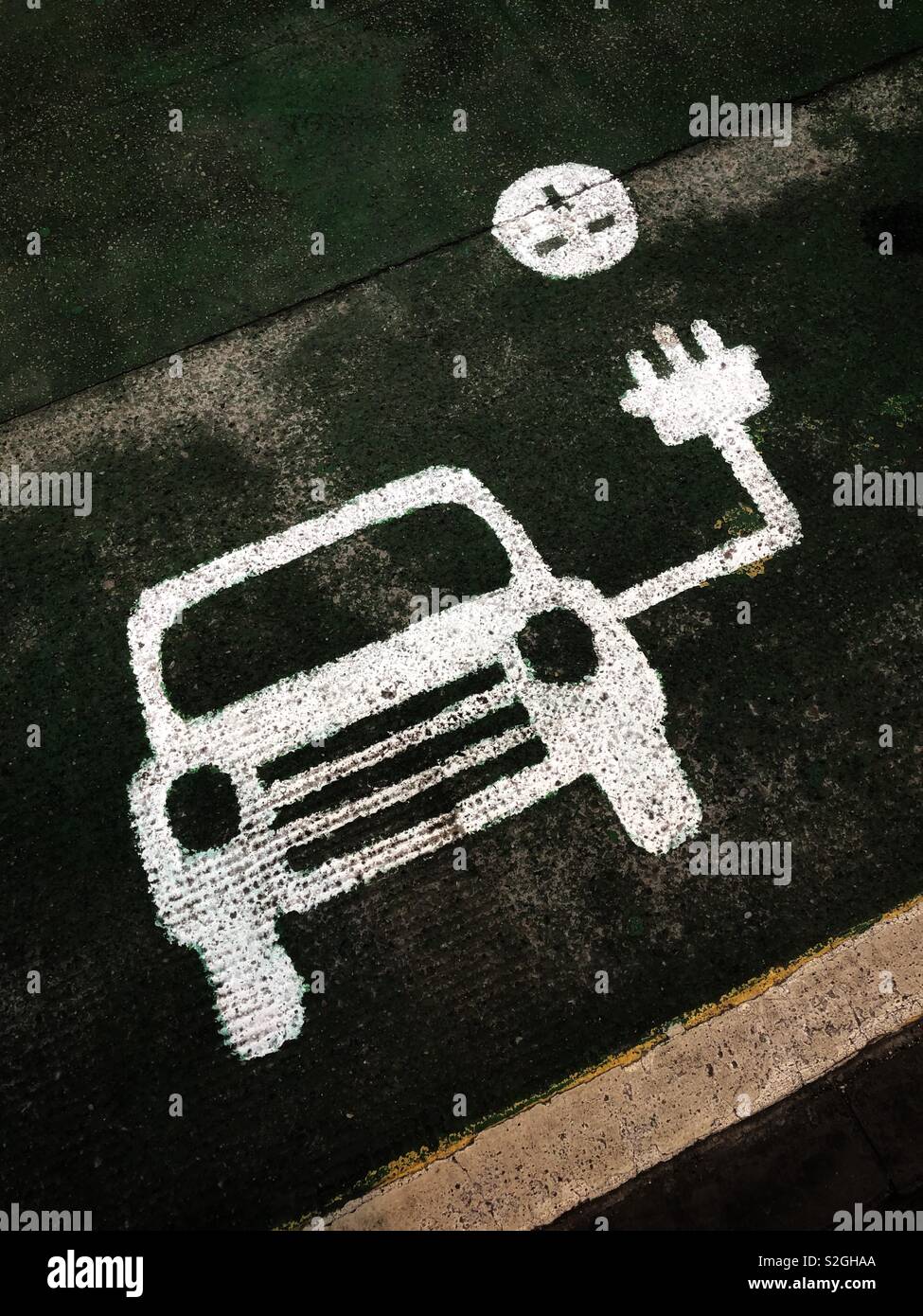 Electric car charging point symbol. Scotland. UK. - Smartphone Captured Stock Image