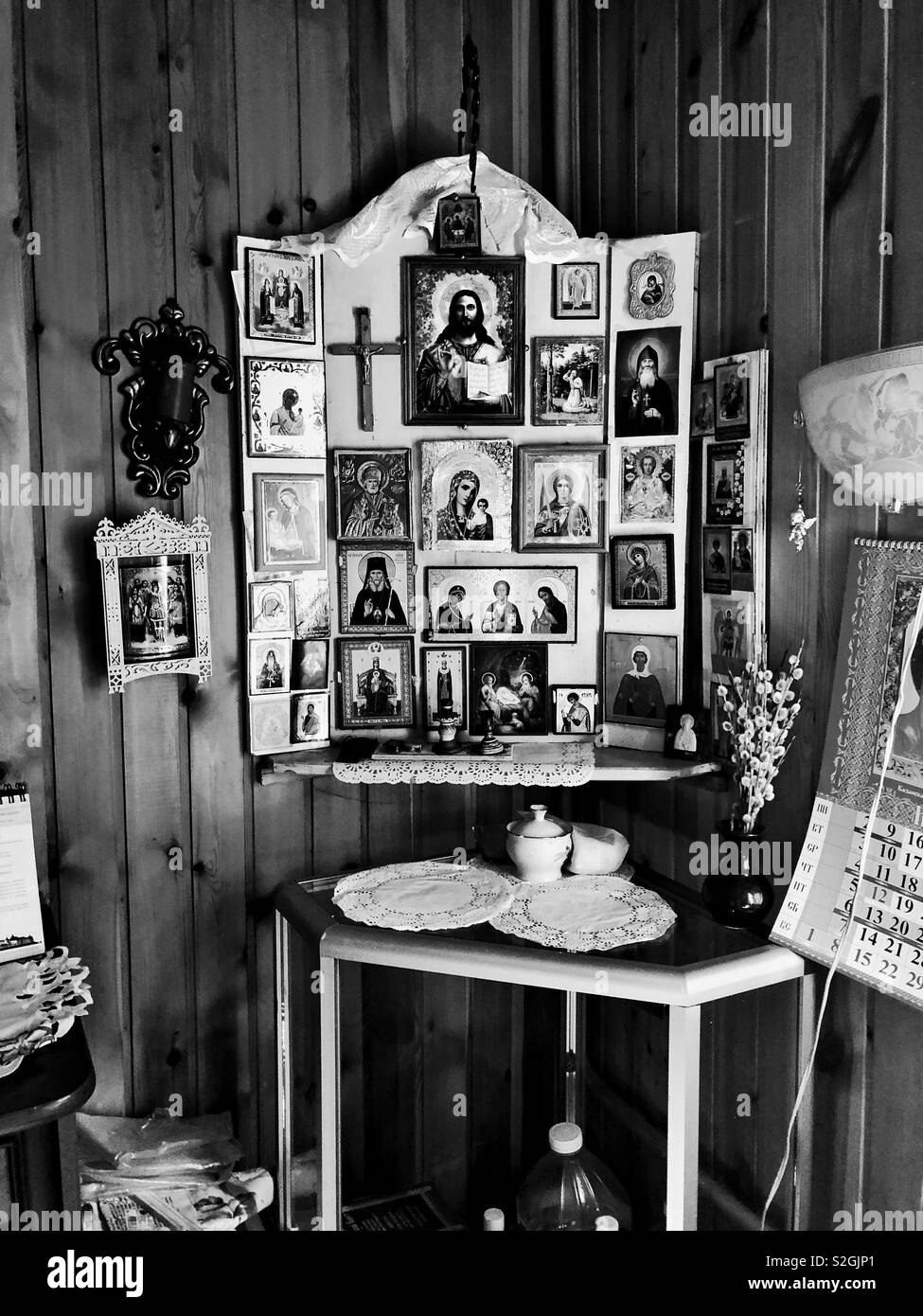 “Red corner” inside living room in Russian dacha with icons Stock Photo