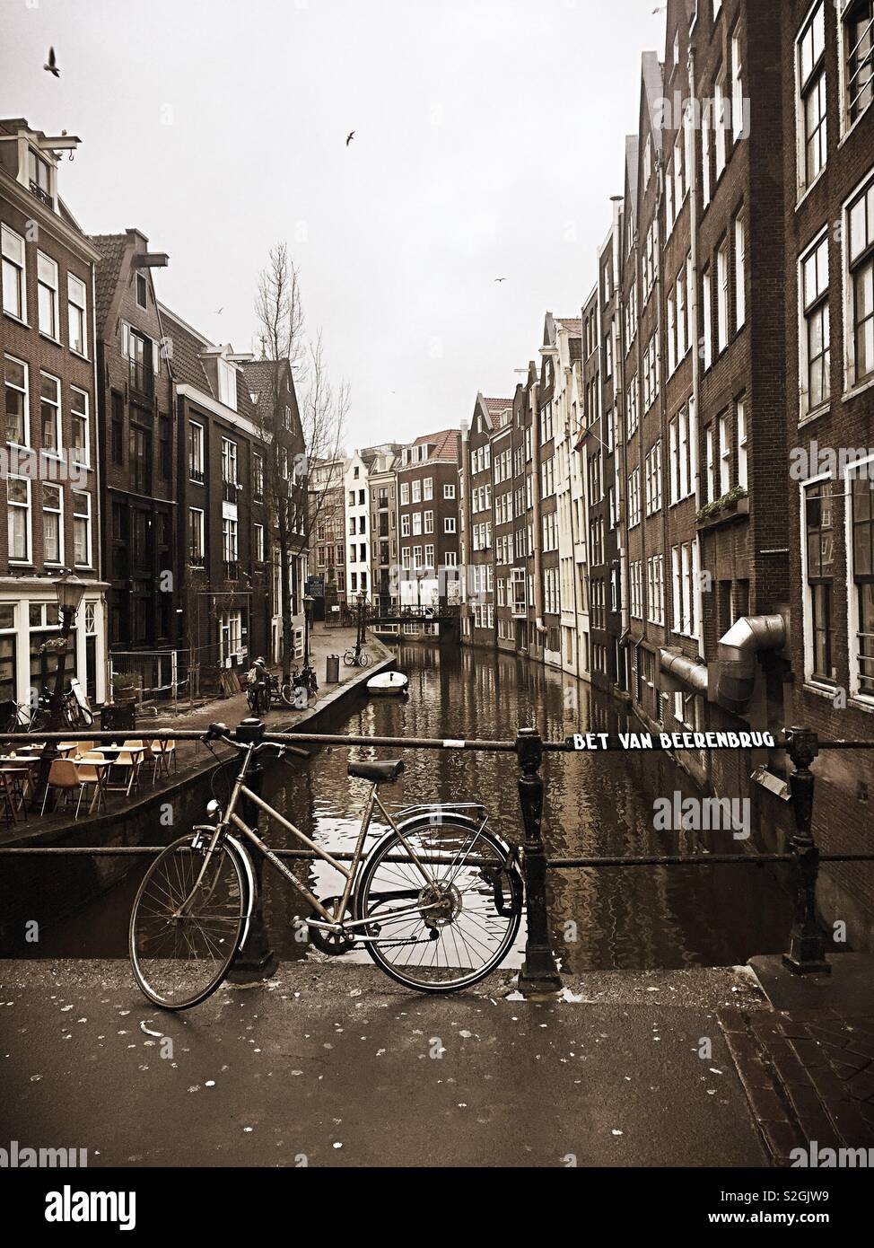 Bicycle by a canal, Amsterdam - Smartphone Captured Stock Image Bicycle by a canal, Amsterdam - Smartphone Captured Stock Image