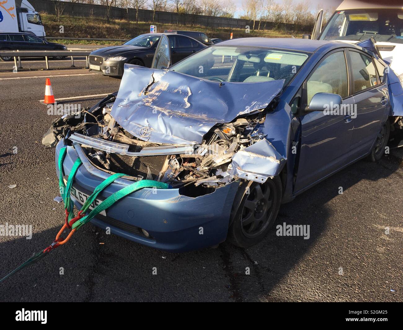 My car after a lorry crashed into the van behind and pushed me into the lorry in front - Smartphone Captured Stock Image