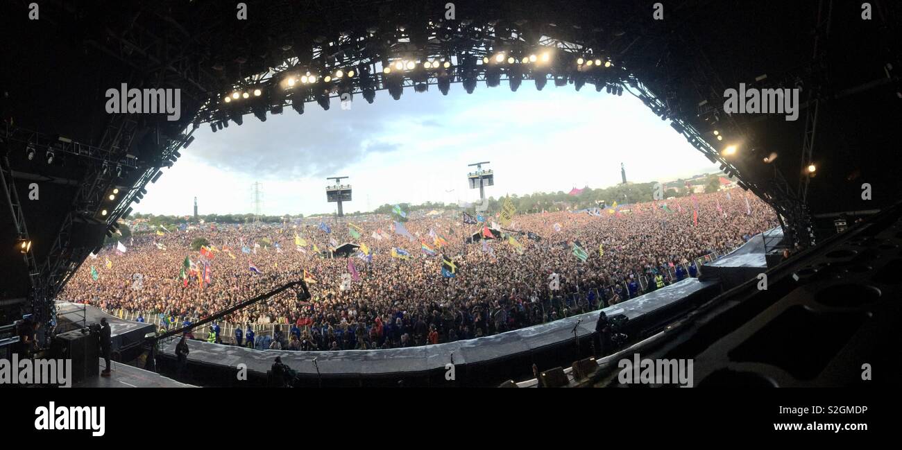 View across audience from center of Glastonbury main stage 2015 Stock Photo