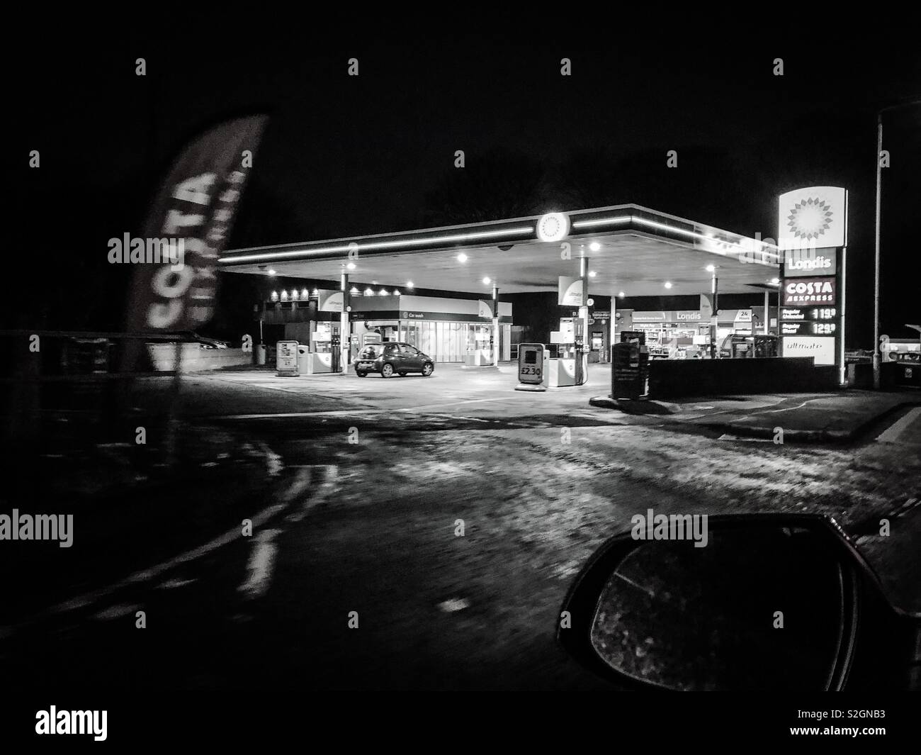Night shot of BP petrol station. Glasgow. Scotland. UK. - Smartphone Captured Stock Image