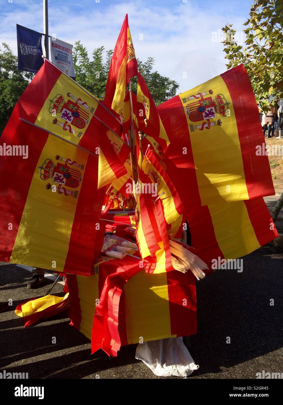 Spanish flags for sale in the streets of Madrid in Spain during Spanish national day celebrations Stock Photo