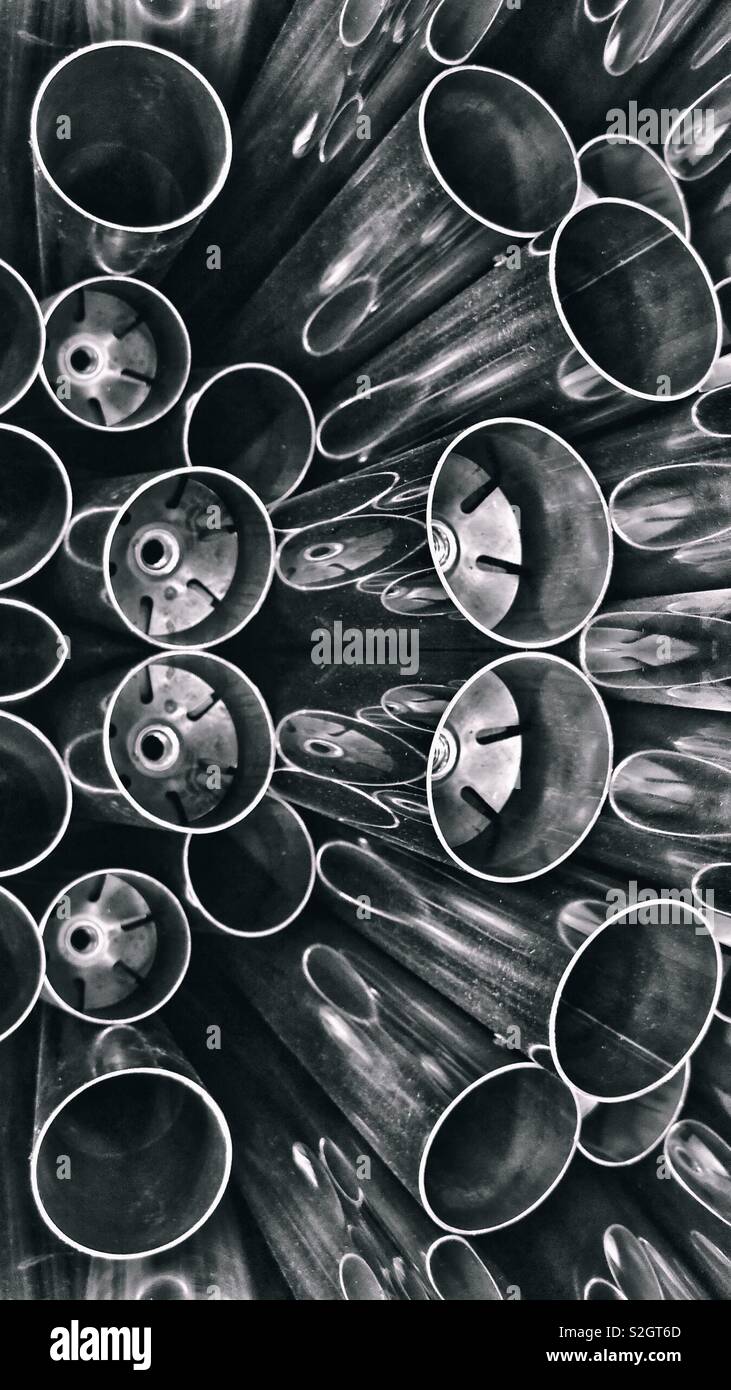 An abstract digital artwork featuring many silver tubes or pipes - Smartphone Captured Stock Image