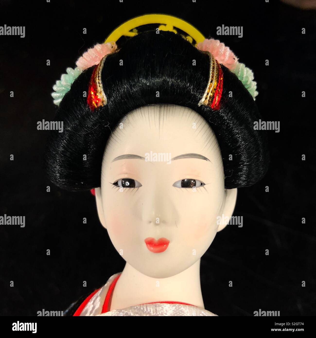 porcelain geisha doll