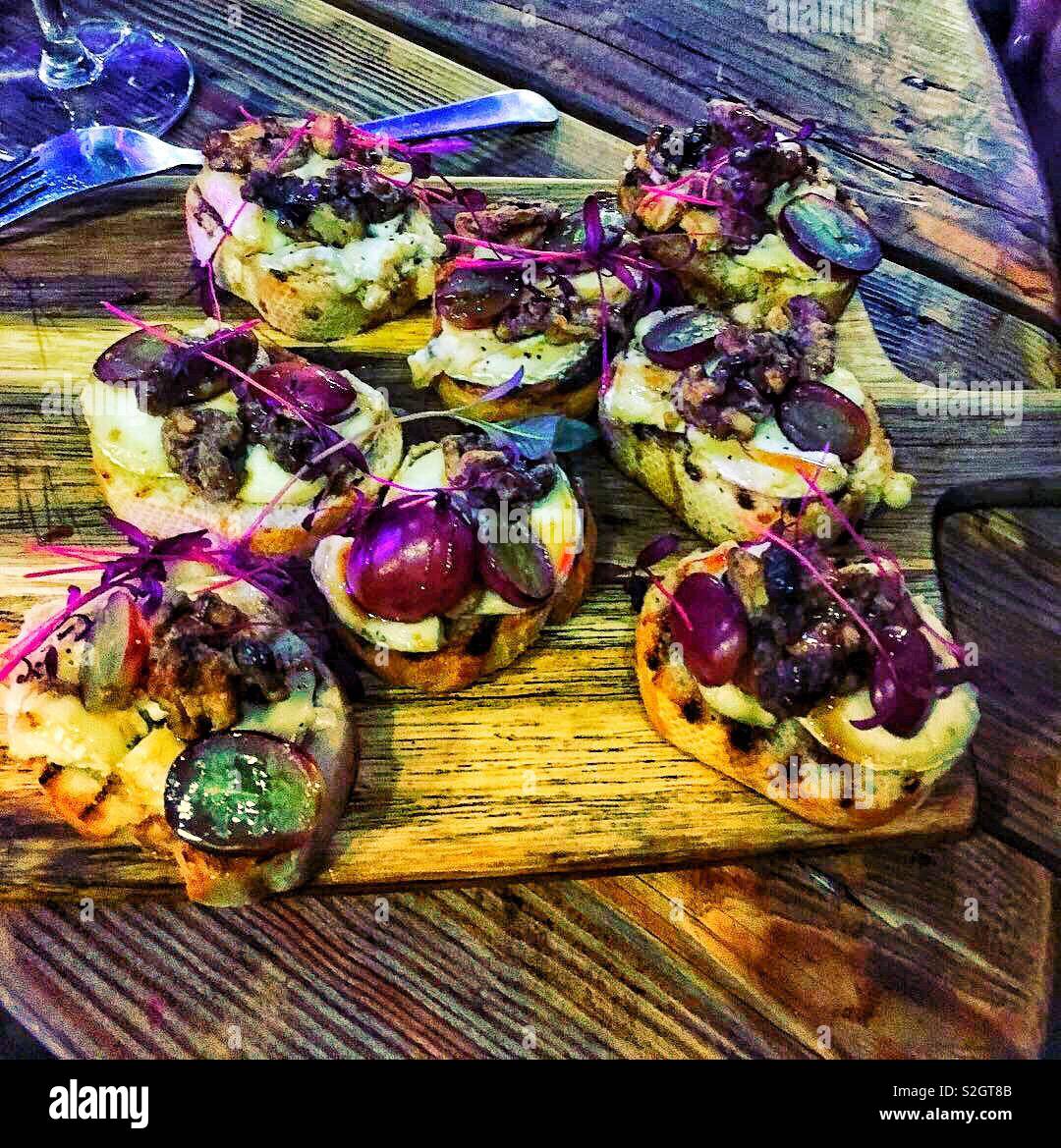 Goats cheese, grape and walnut Bruschetta Stock Photo Alamy