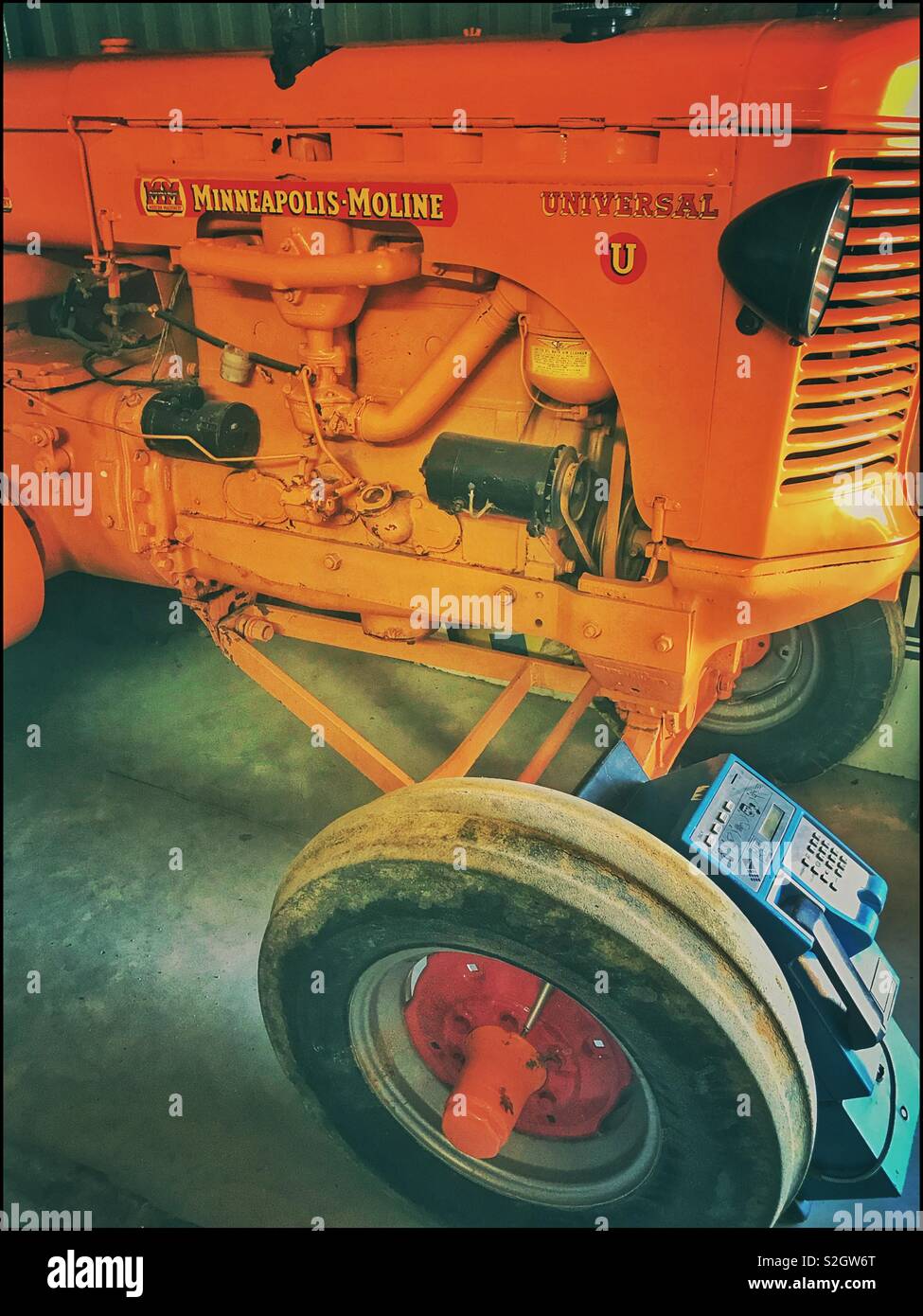 Vintage tractors in shed at Toeka Stoor in Windmeul near Paarl, South Africa. Stock Photo