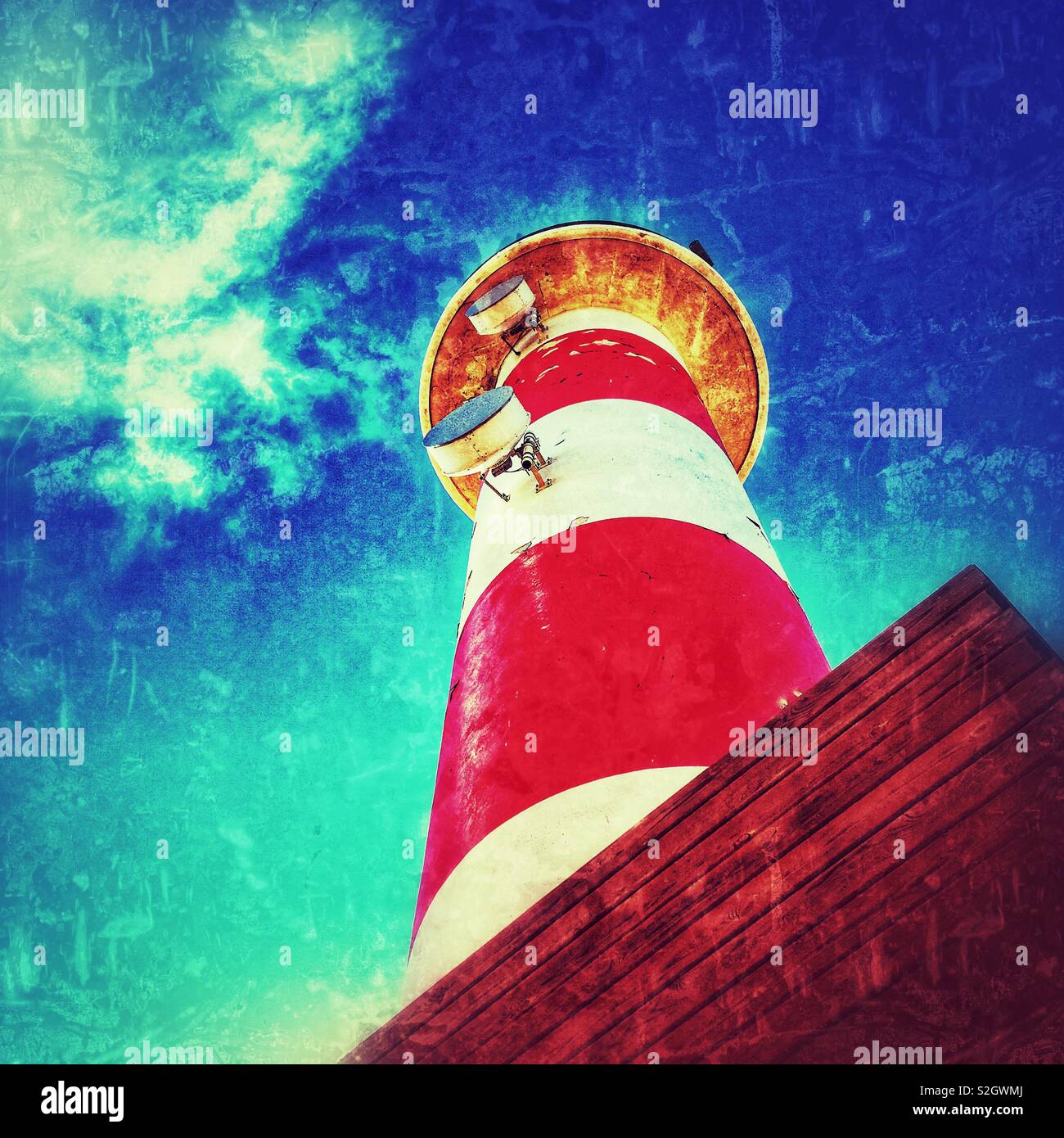 Lighthouse tower looking up in high colour and grunge effect Stock Photo