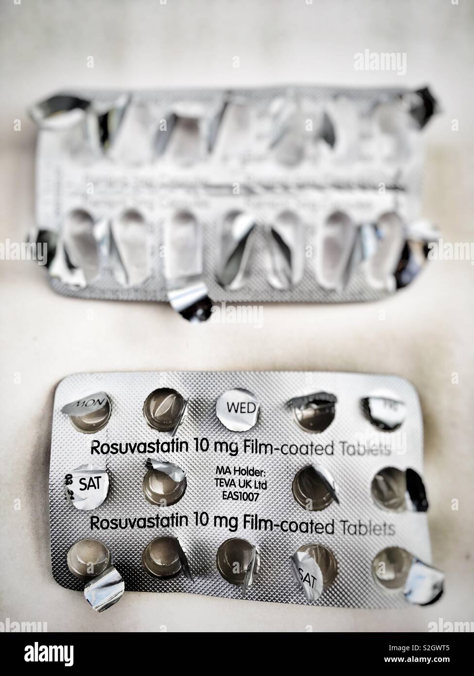 Empty Rosuvastatin and Ramipril packets Stock Photo