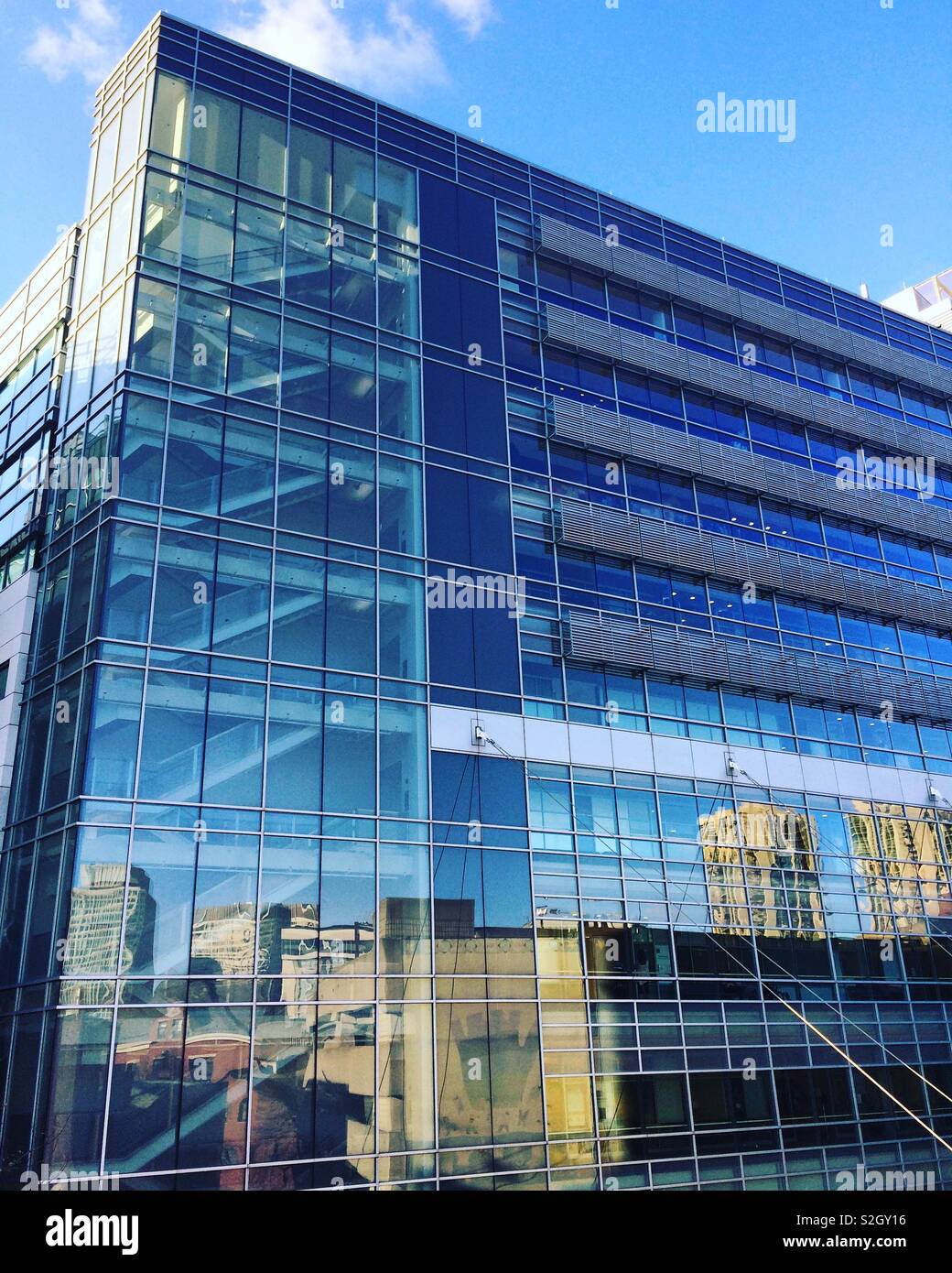 Reflections on the facade of the Yawkey Center for Outpatient Care, Massachusetts General Hospital, Boston, Massachusetts, United States Stock Photo