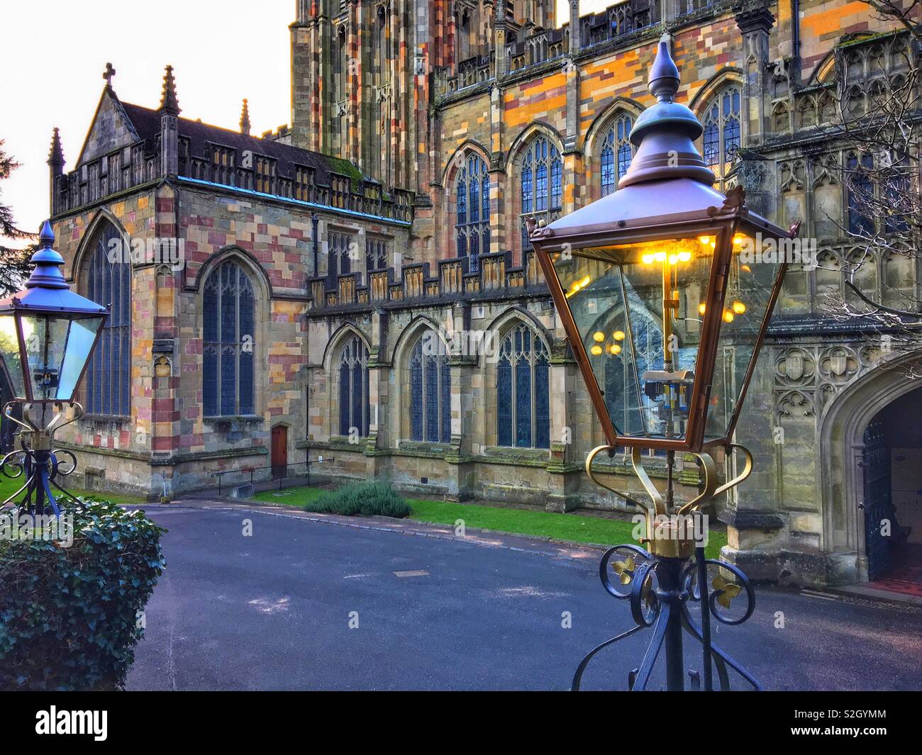 Great Malvern Priory with gas light Stock Photo