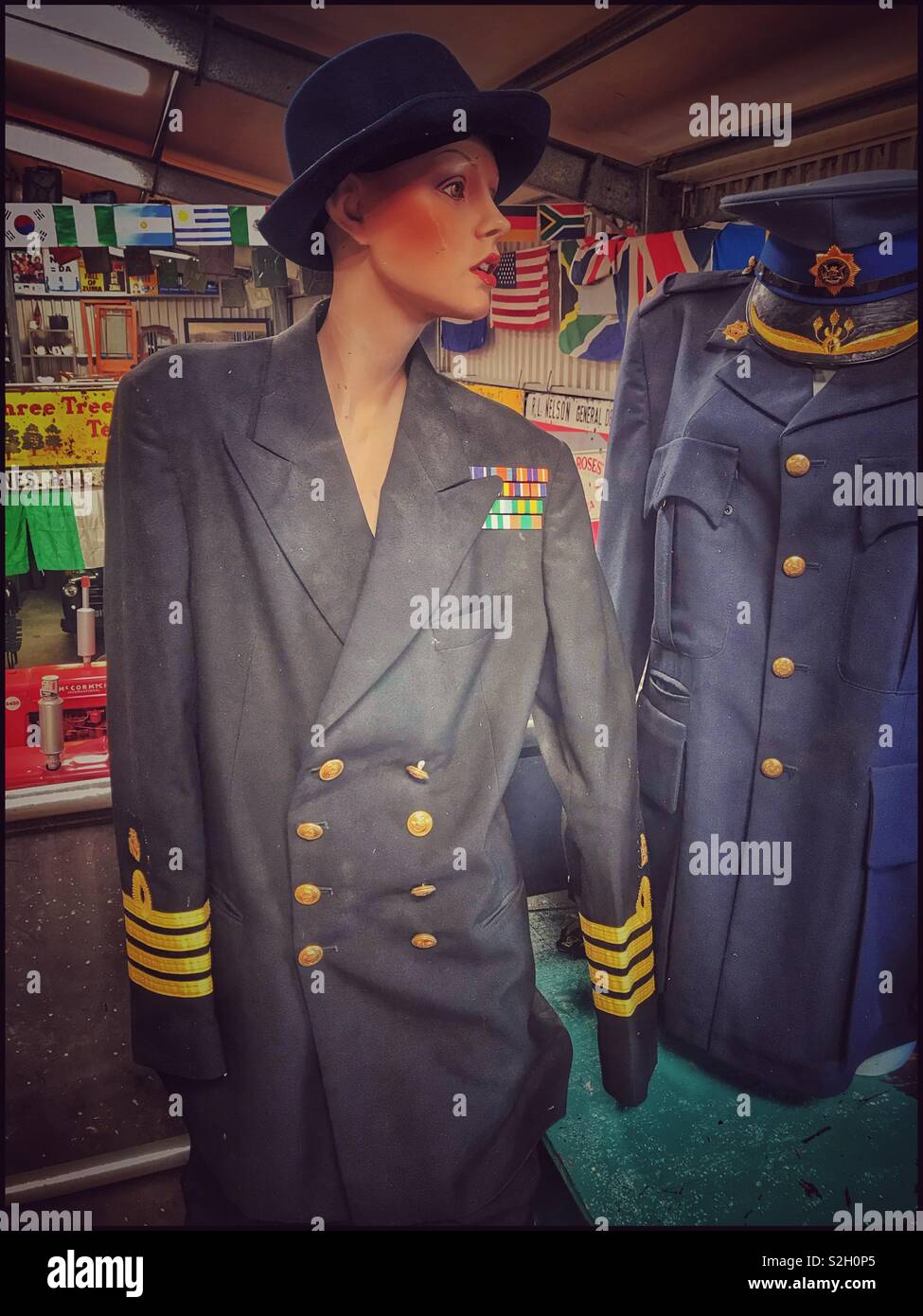 Vintage uniform on mannequin and collectibles at Toeka Stoor, Paarl, South Africa. - Smartphone Captured Stock Image