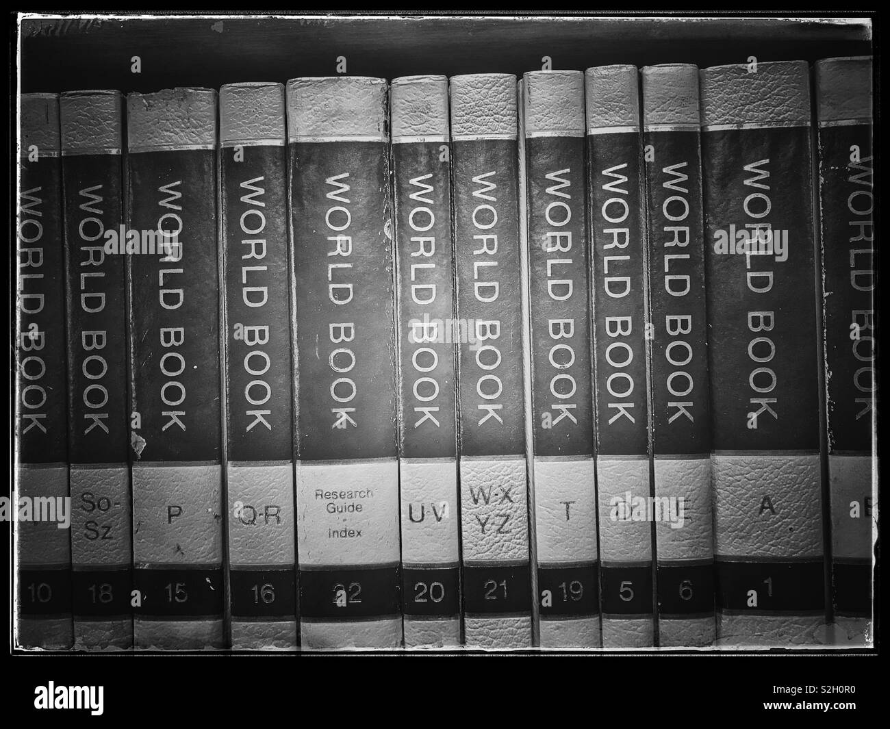 Black and white photo of Vintage set of World Books in Toeka Stoor, Paarl, South Africa. - Smartphone Captured Stock Image