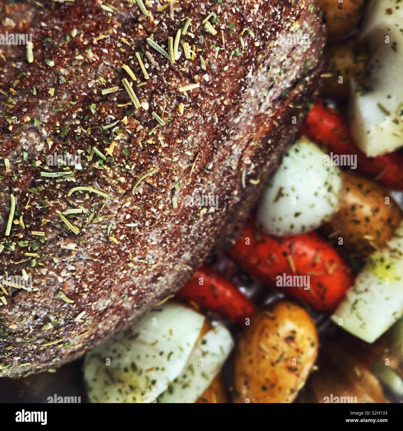 Closeup view of seasoned roast beef and vegetables - Smartphone Captured Stock Image