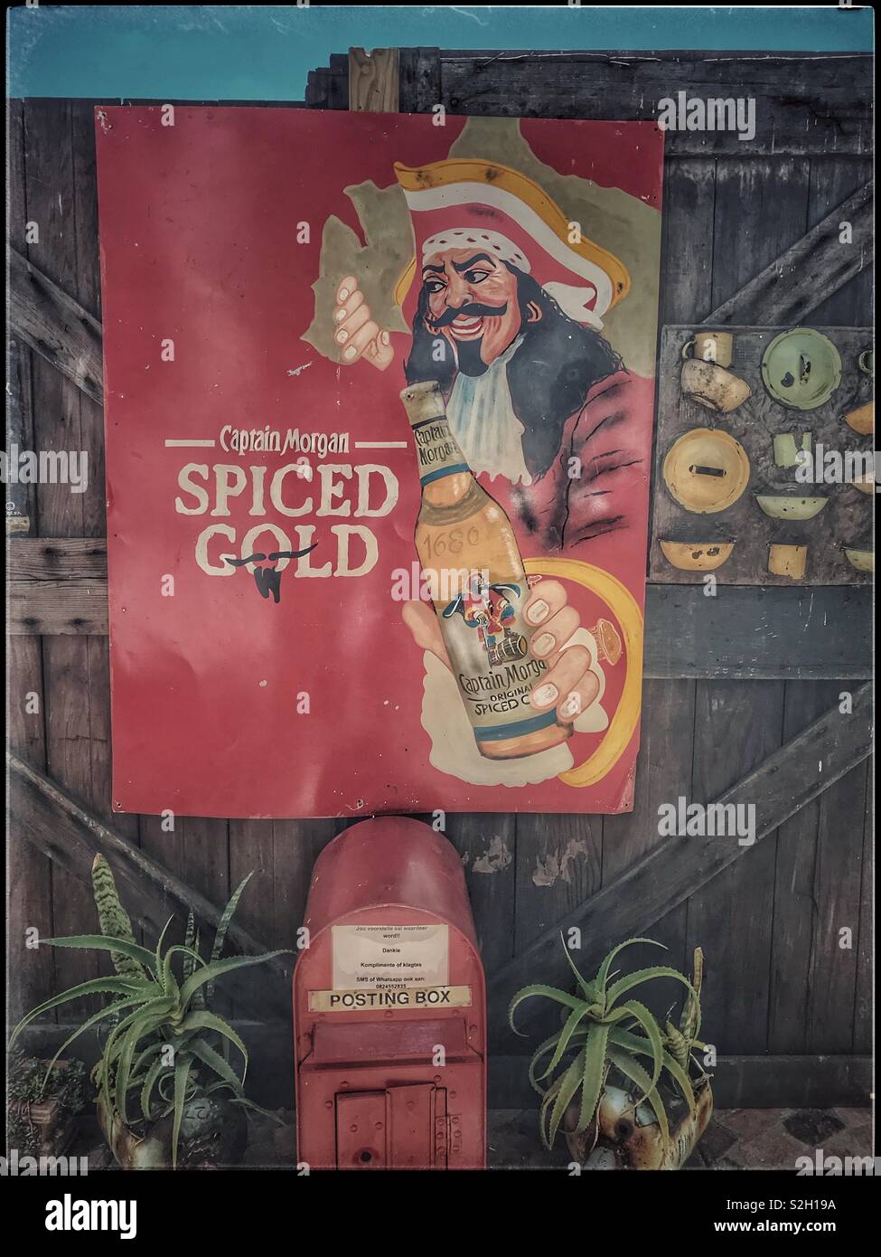 Vintage Captain Morgan spiced gold ad sign at Toeka Stoor near Paarl ...