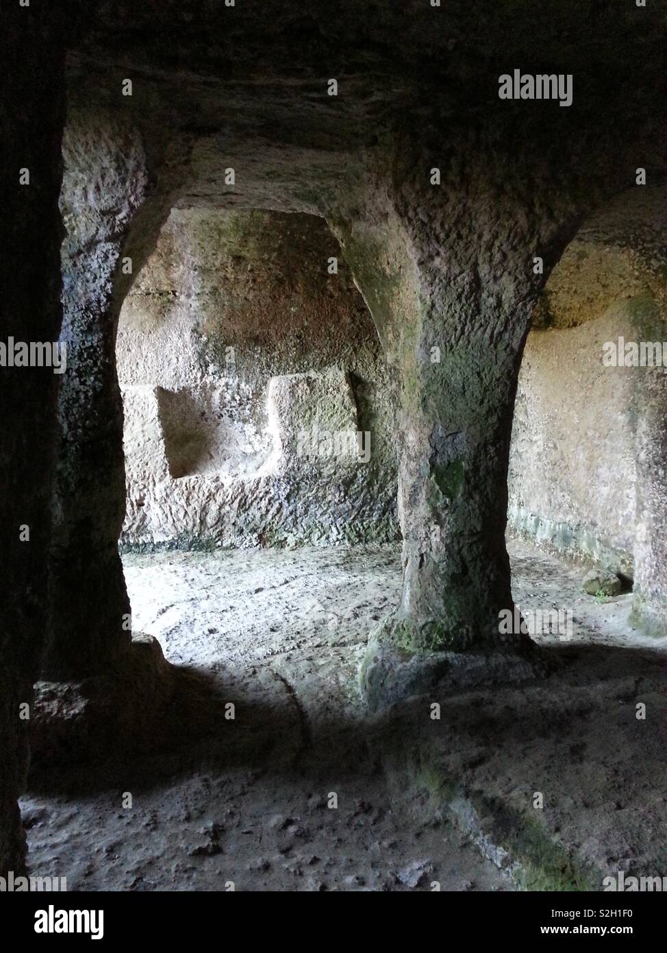 Interior of rare 12th Century subterranean church at Gurat, Charente, France carved from the living rock. - Smartphone Captured Stock Image