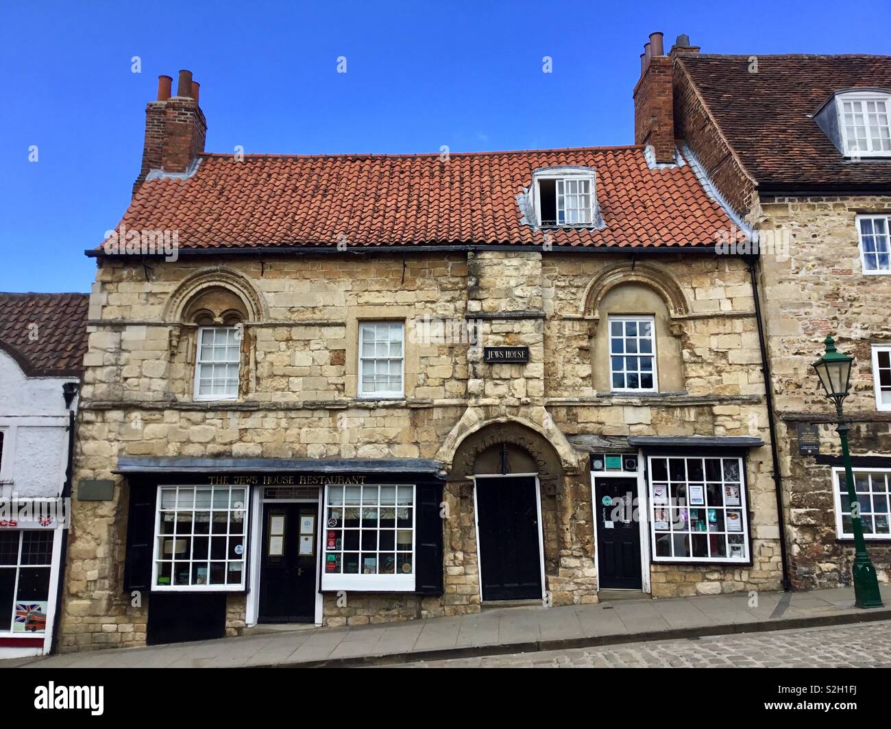 The Jew’s House, Steep Hill, Lincoln a 13th Century Building and one of the oldest domestic buildings in England. - Smartphone Captured Stock Image