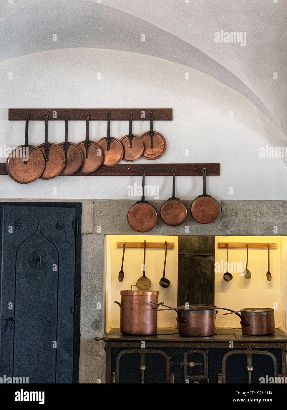 Kitchen at Pena palace in portugal showcasing spectacular copper pots. December 2018 - Smartphone Captured Stock Image