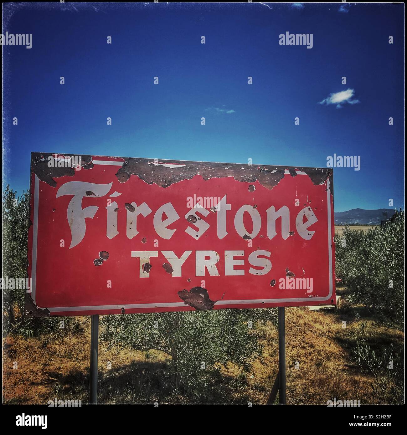 Firestone Tyres ad at Toeka Stoor, Paarl, South Africa. Stock Photo