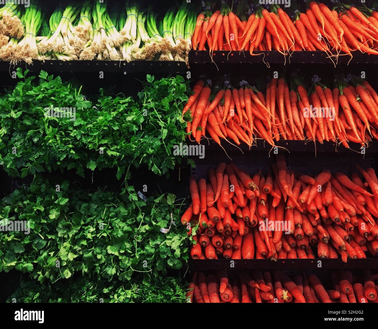 Close up of a produce shelf at the grocery store Stock Photo - Alamy
