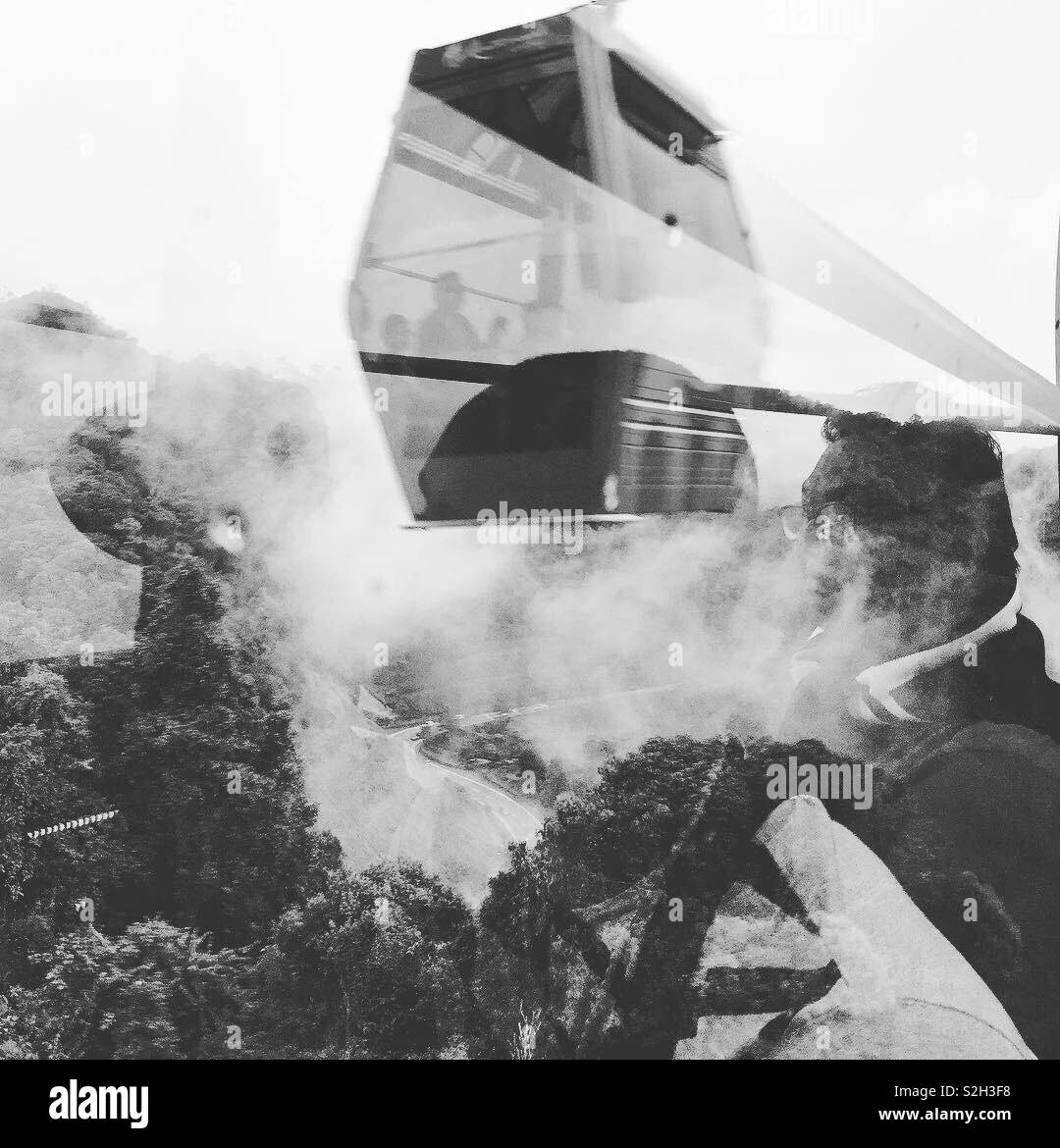 Riding in a sky cable. - Smartphone Captured Stock Image