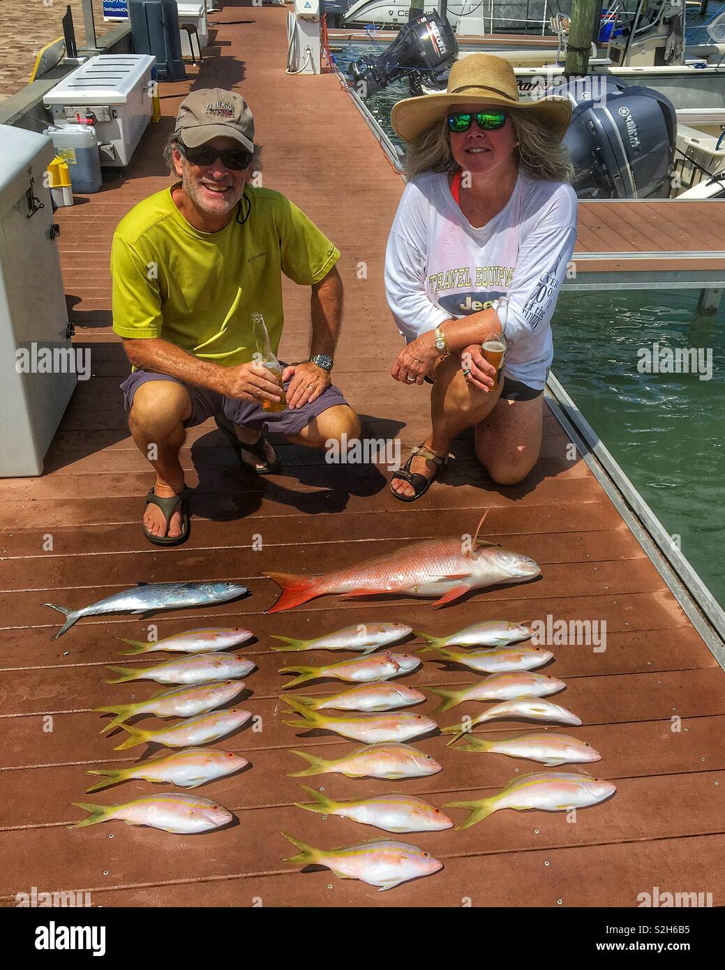 Fishing charter in Marathon Fl Keys. The red fish is 15lbs and a great