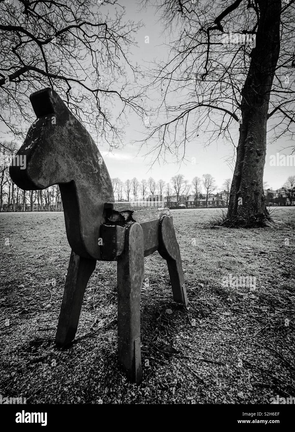 Children’s wooden play horse in park. Glasgow. Scotland. UK. - Smartphone Captured Stock Image