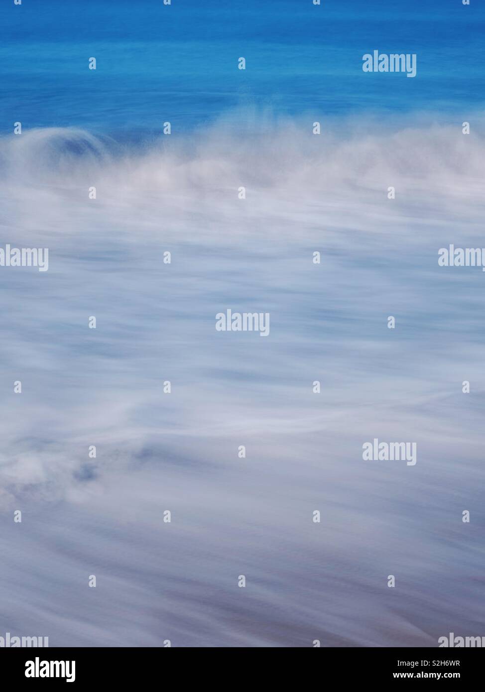 Long exposure of waves and surf rolling in California. - Smartphone Captured Stock Image