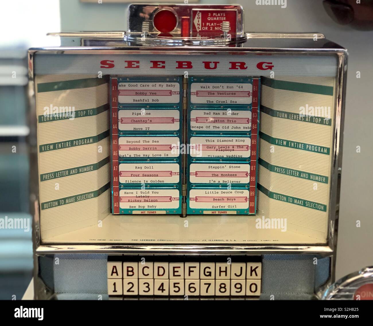 A 1950s era remote selector wall jukebox. Stock Photo