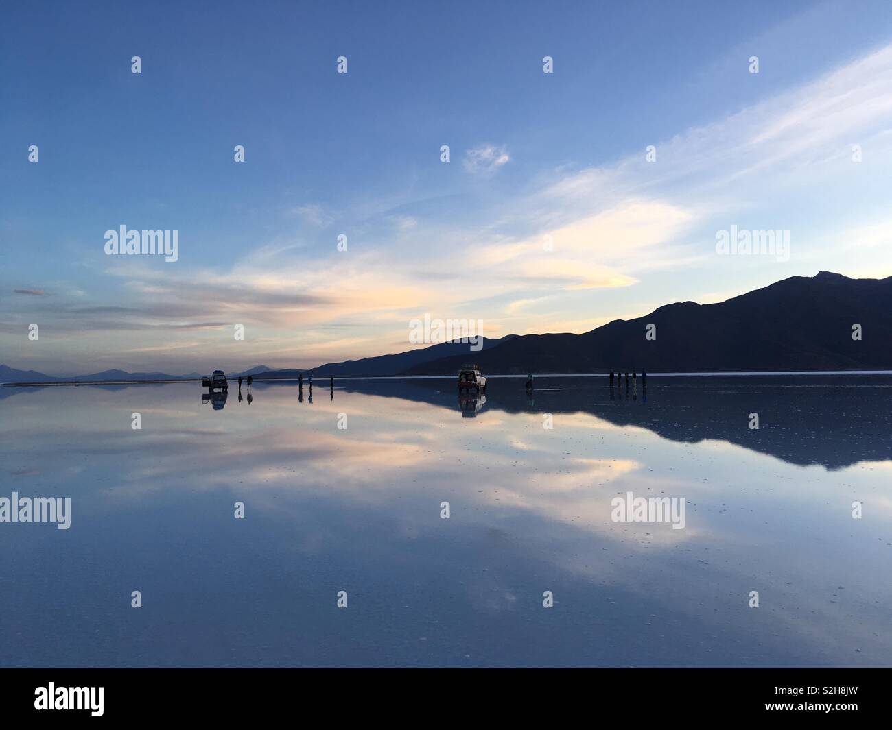 Mirror reflections on the world’s largest salt flats Salar de Uyuni, Bolivia Stock Photo